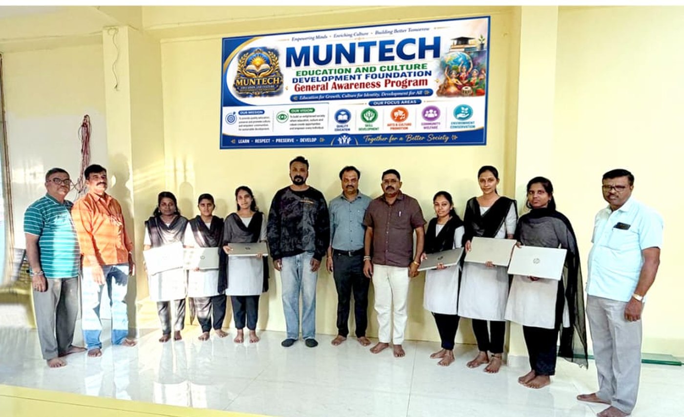 Directors and members of the Foundation with students holding their new laptops